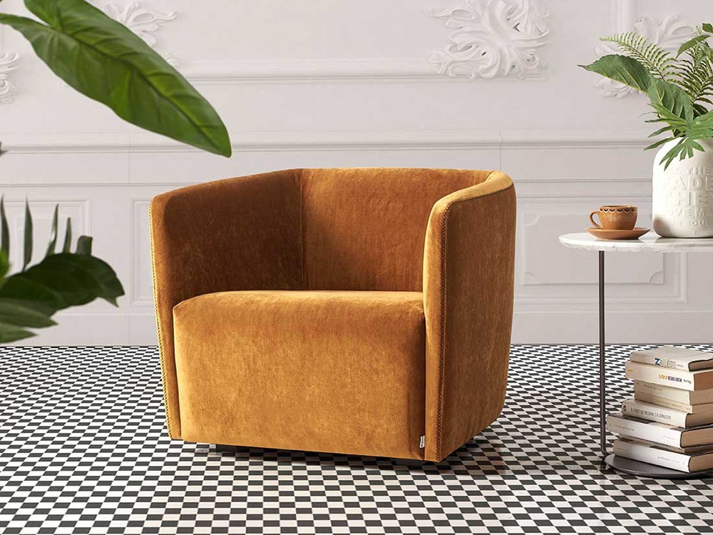 Butaca giratoria Ecko de líneas suaves y confort envolvente. Diseño funcional y elegante.