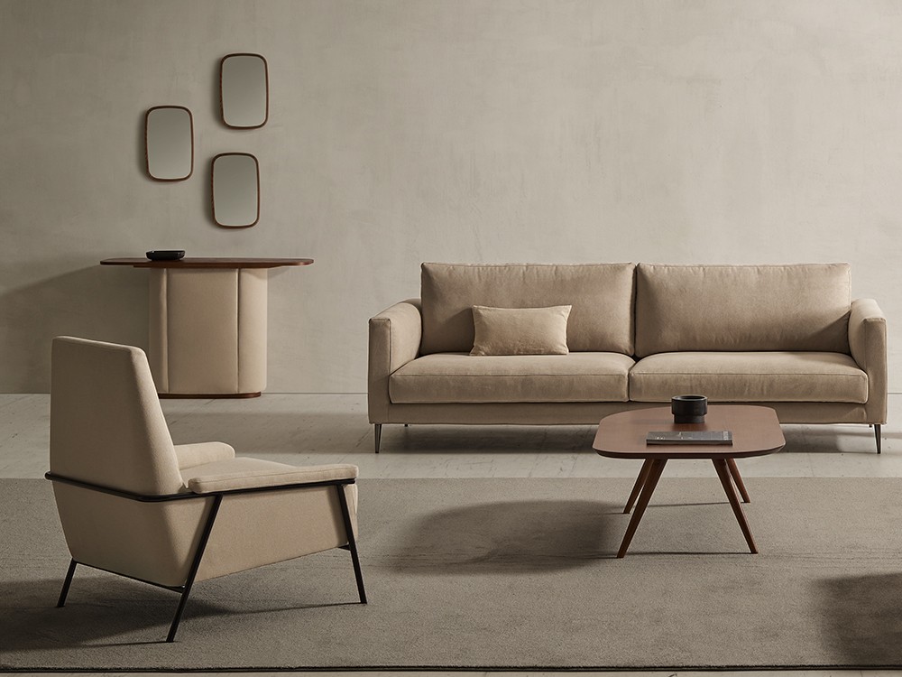 Bluss destaca por su forma arquitectónica y confort envolvente. Una butaca de diseño con carácter y estilo propio.