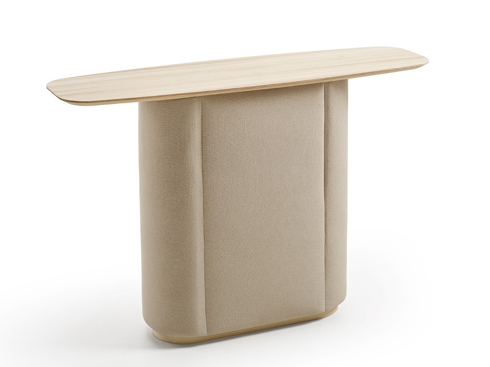 Consola Iris con sobre de fresno macizo y base tapizada. Un diseño elegante para ambientes sofisticados y con estilo propio.