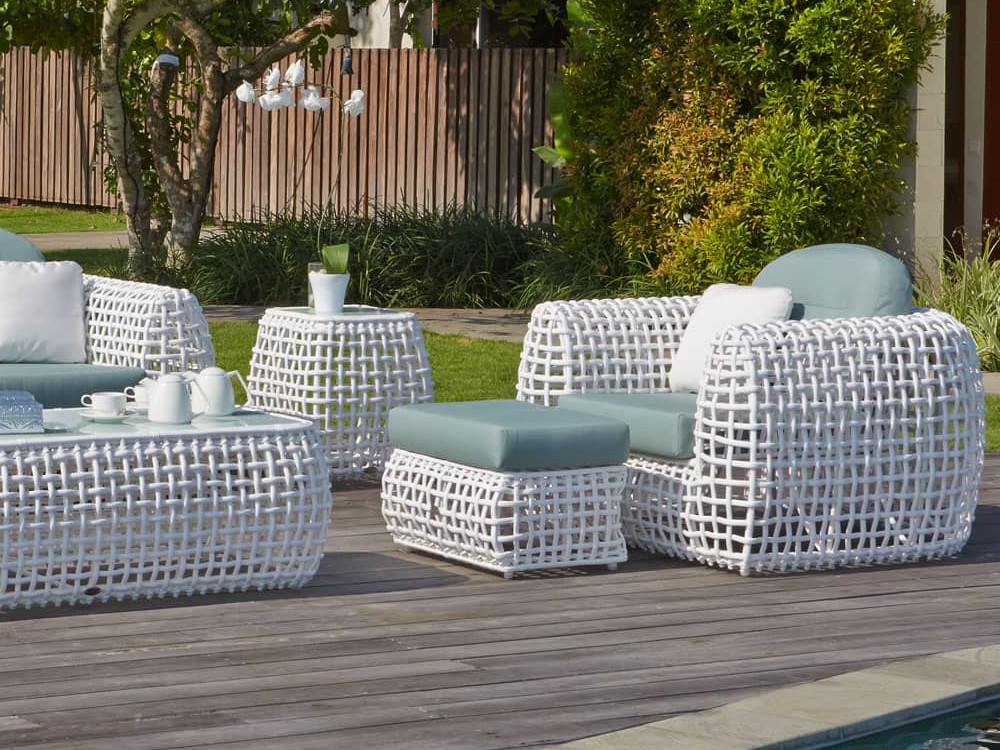 Otomán de aluminio y fibra sintética trenzada con cojín tapizado Dinasty de Skyline - 1