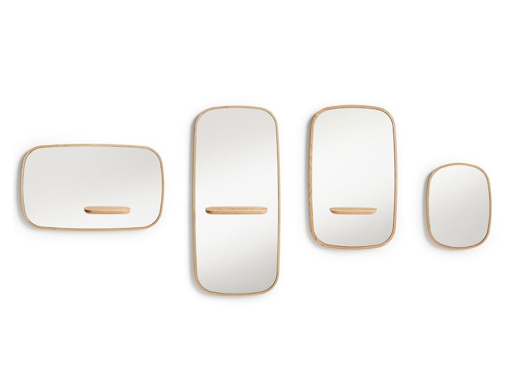 Con su diseño envolvente, el espejo Pond aporta estilo y calidez. Ideal para salones, recibidores o dormitorios.