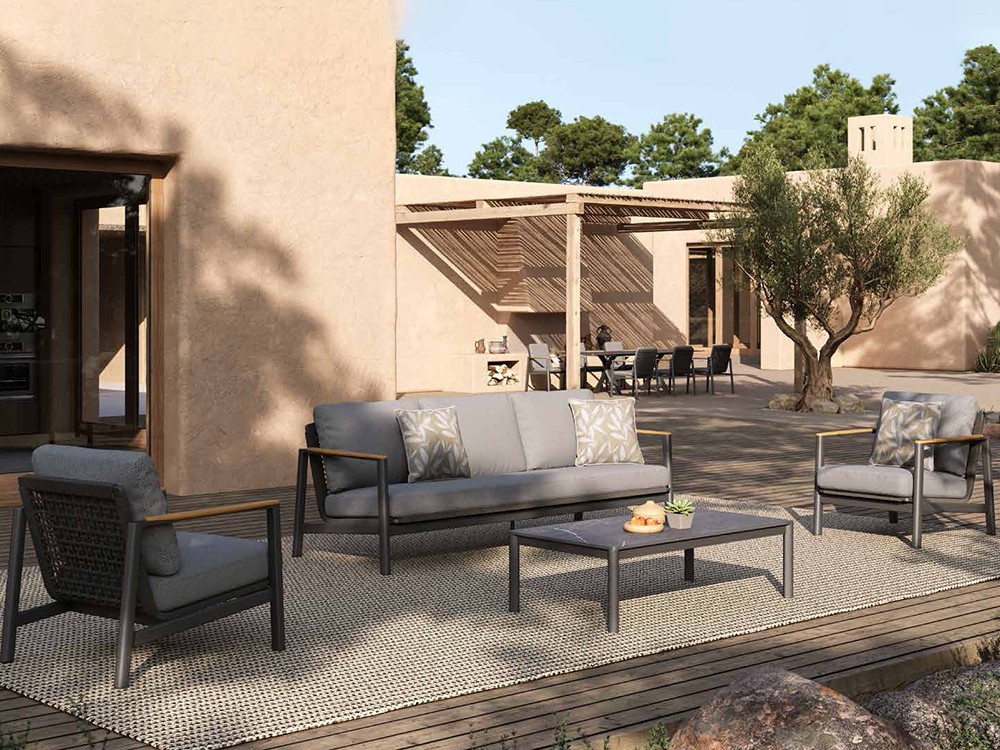 Sofá Rossano de Joenfa Agua de Mar con respaldo en fibra sintética trenzada y diseño personalizable en tapizados outdoor.