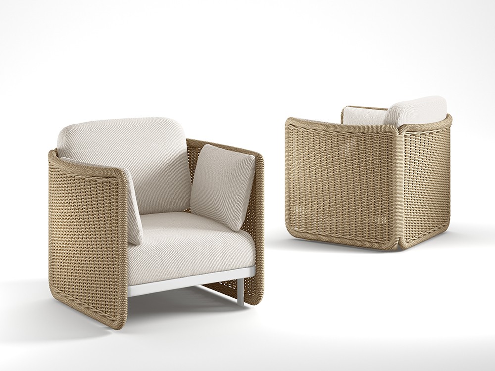 Diseño trenzado en fibra sintética natural del sillón Galatina: un toque artesanal para tu jardín o terraza.
