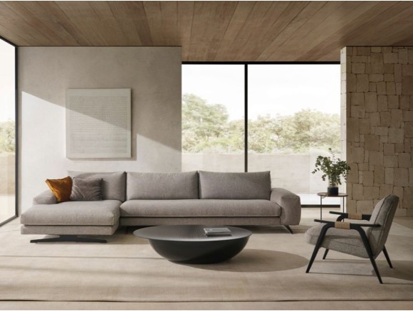 El sofá Nudo aporta elegancia minimalista al salón con su diseño limpio y contemporáneo.