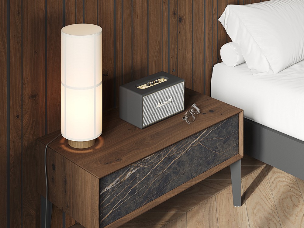 El frente del cajón de la mesita de noche Angul tiene acabado porcelánico Vive muebles