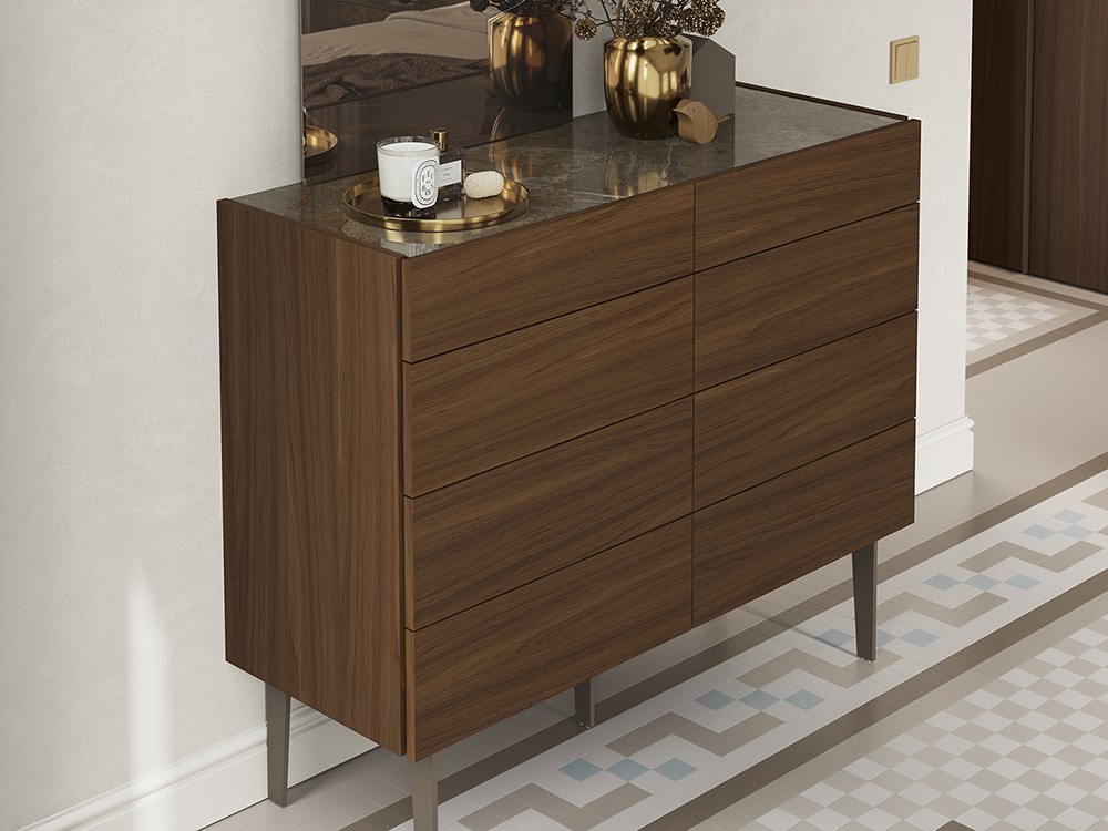 La tapa de la cómoda sora es de cristal impreso Stone de Vive muebles