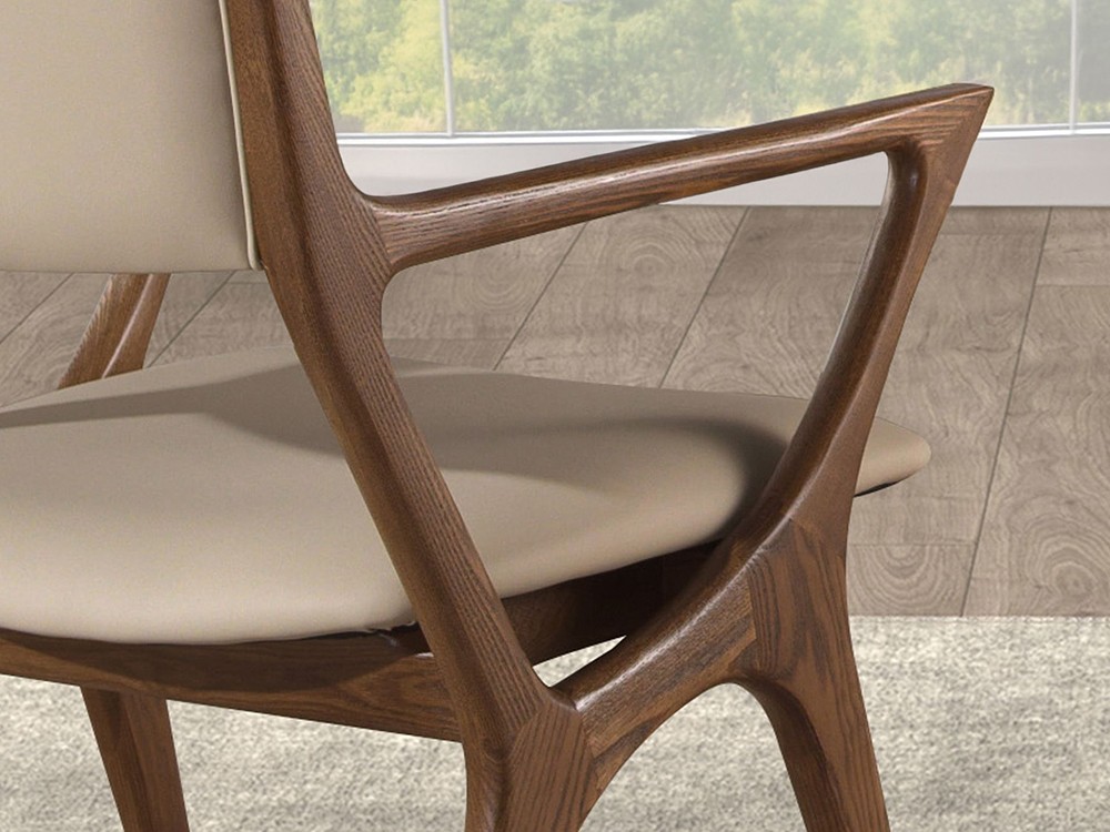 Detalle de la estructura de madera y el tapizado polipiel visón de la silla 4199 de Ángel Cerdá