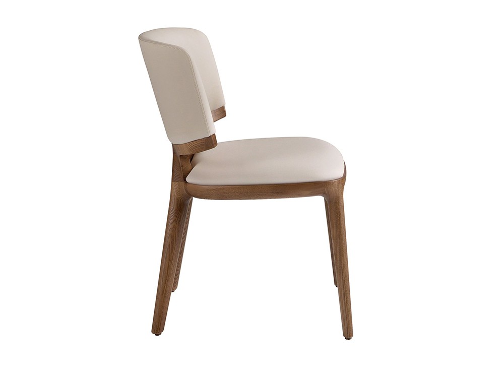 Respaldo de líneas envolvente que invita a largas sobremesas, silla 4206 de Ángel Cerdá