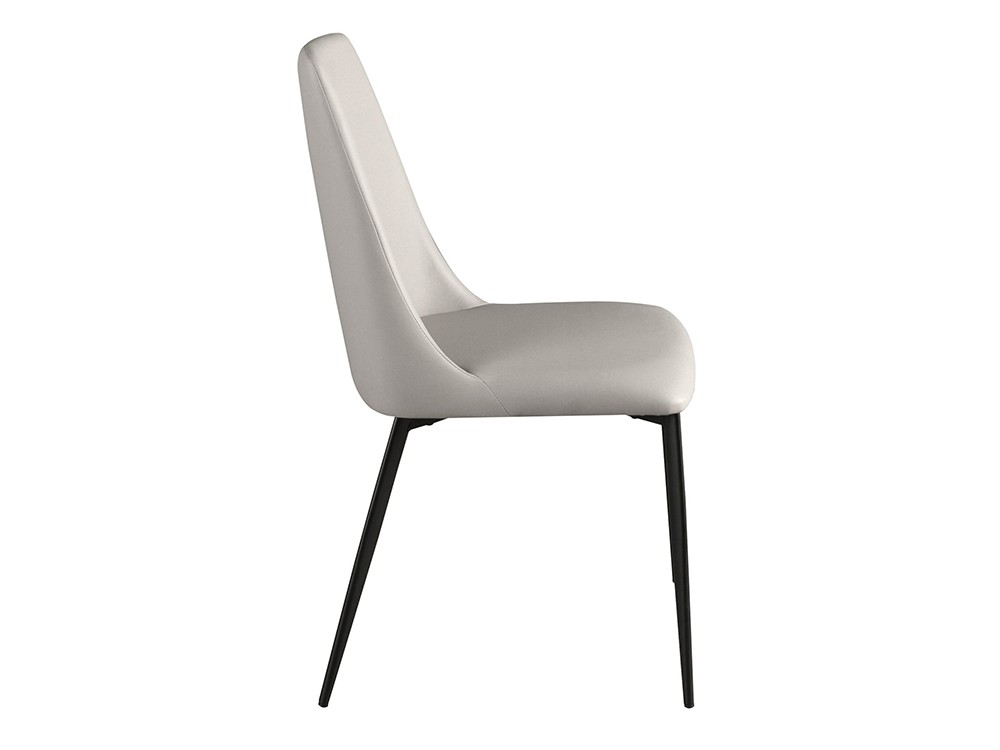 las patas de acero inoxidable negro aligeran visualmente la silla 4184 de Ángel Cerdá