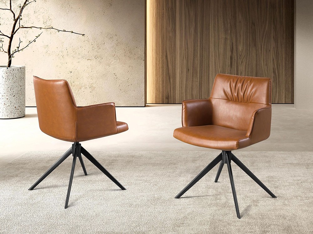 Silla tapizada en polipiel marrón con base giratoria de acero negro 4193 de Ángel Cerdá.