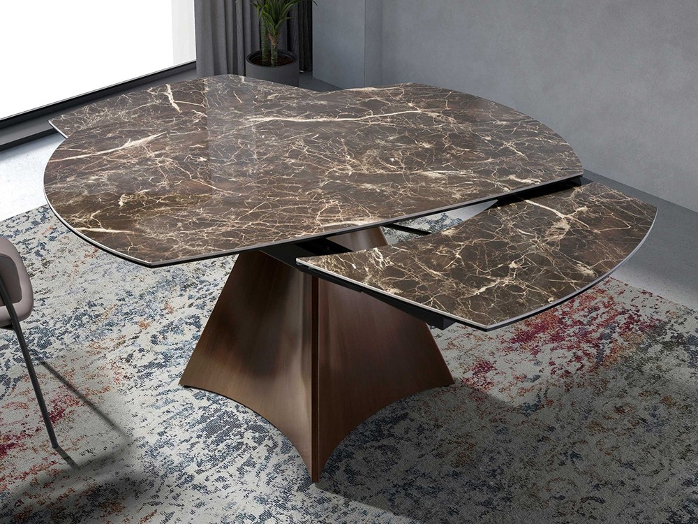 Apertura giratoria del sobre extensible de la mesa 1113 de Ángel Cerdá