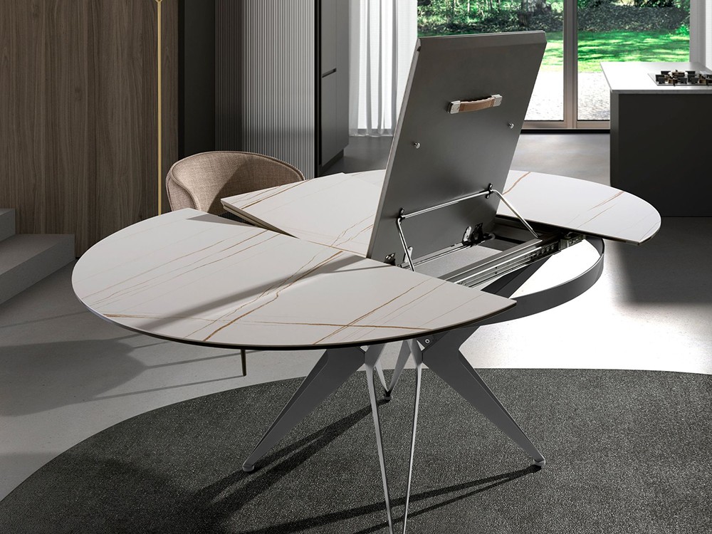 Extensión central también en porcelánico, mesa redonda 1119 de Angel cerda