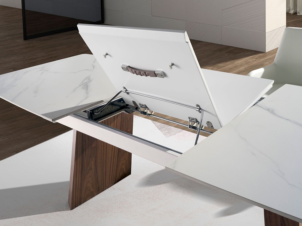 Detalle del extensible mariposa central en DM lacado en blanco, mesa 1134 Ángel Cerdá