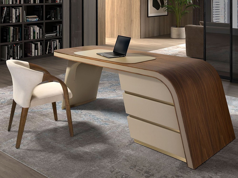 Con sobre de chapa natural de nogal combinado con tapizado en polipiel cream 3268 de Ángel Cerdá