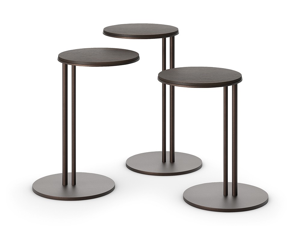Mesas en distintas alturas y diámetros Sting de Cattelan