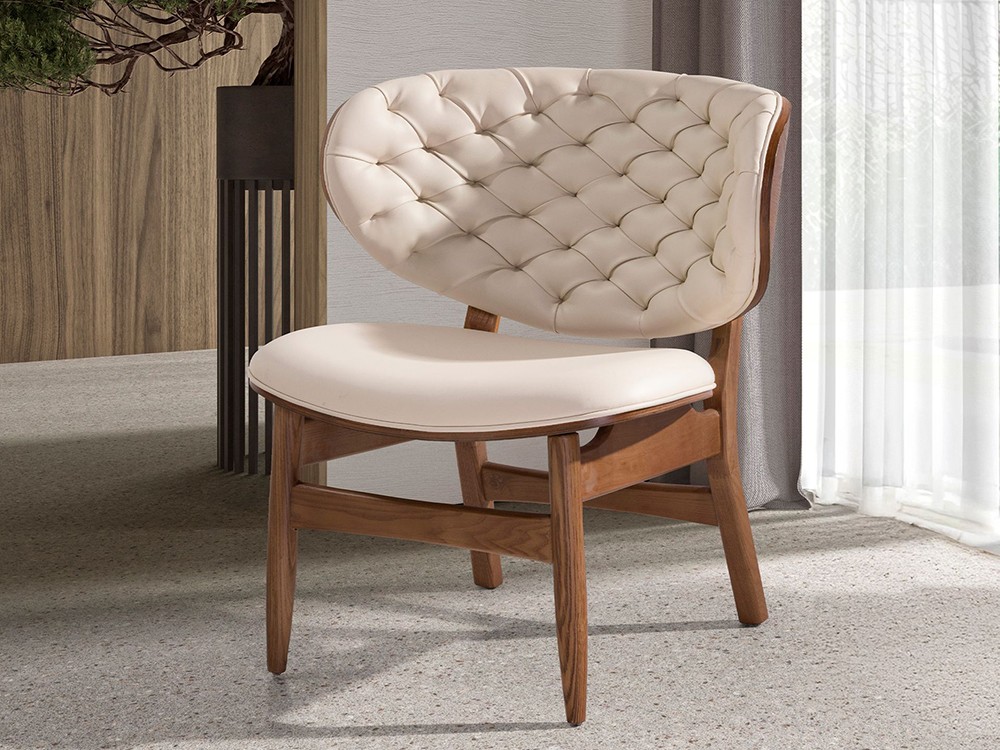 Sillón tapizado en polipiel capitoné 5141 de Ángel Cerdá