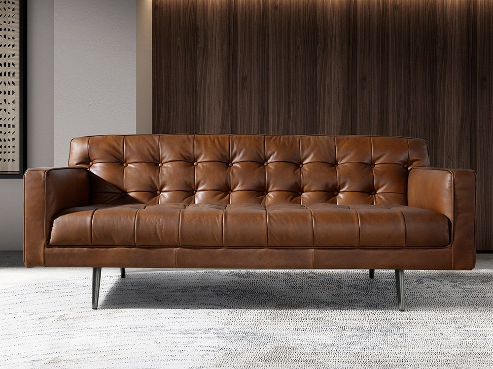 Con patas de acero oscuro, que le dan un aire de modernidad al sofá 6224 o 6225 de Ángel Cerdá