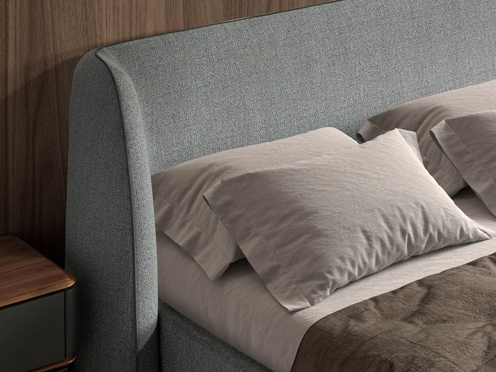 Detalle del cabecero tapizado en tejido 7145 de Ángel cerdá