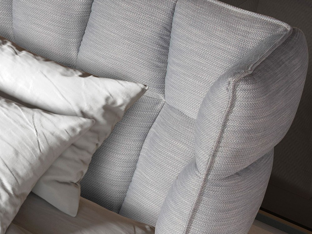 Detalle del cabecero tapizado en tejido 7211 de Ángel cerdá