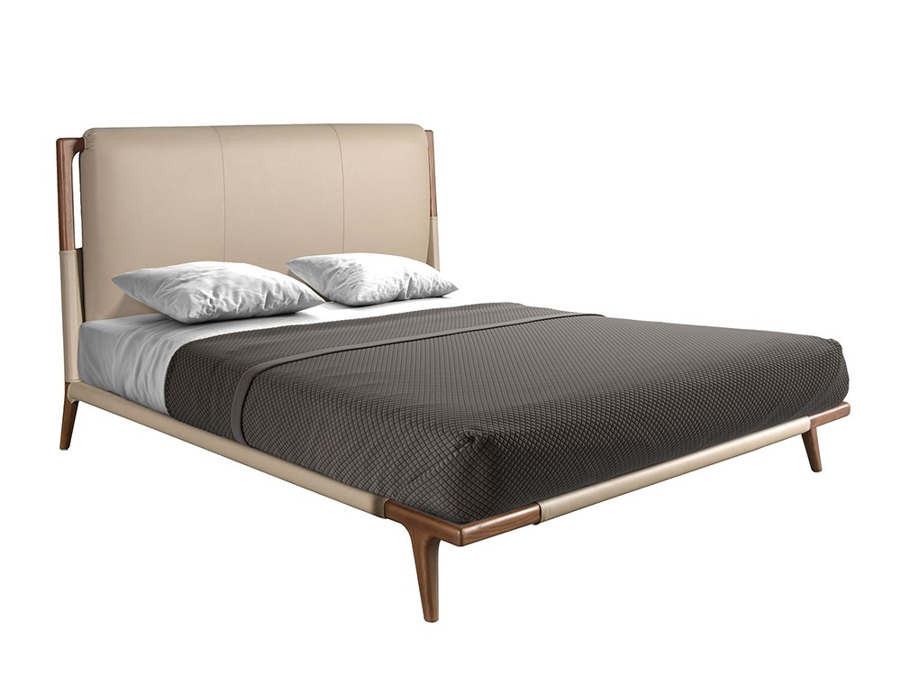 Cabecero de líneas envolventes tapizado en polipiel 7194 de Ángel Cerdá