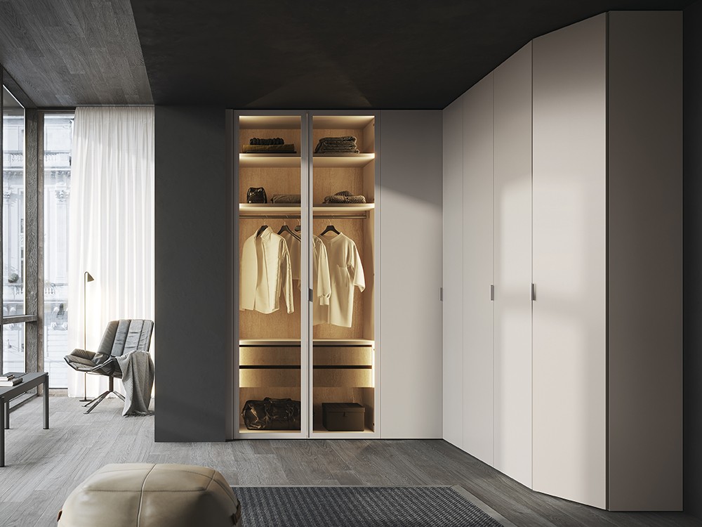 Armario a medida de rincón con puertas batientes Nuda vitrina y Zero de la colección Misura de García Sabaté