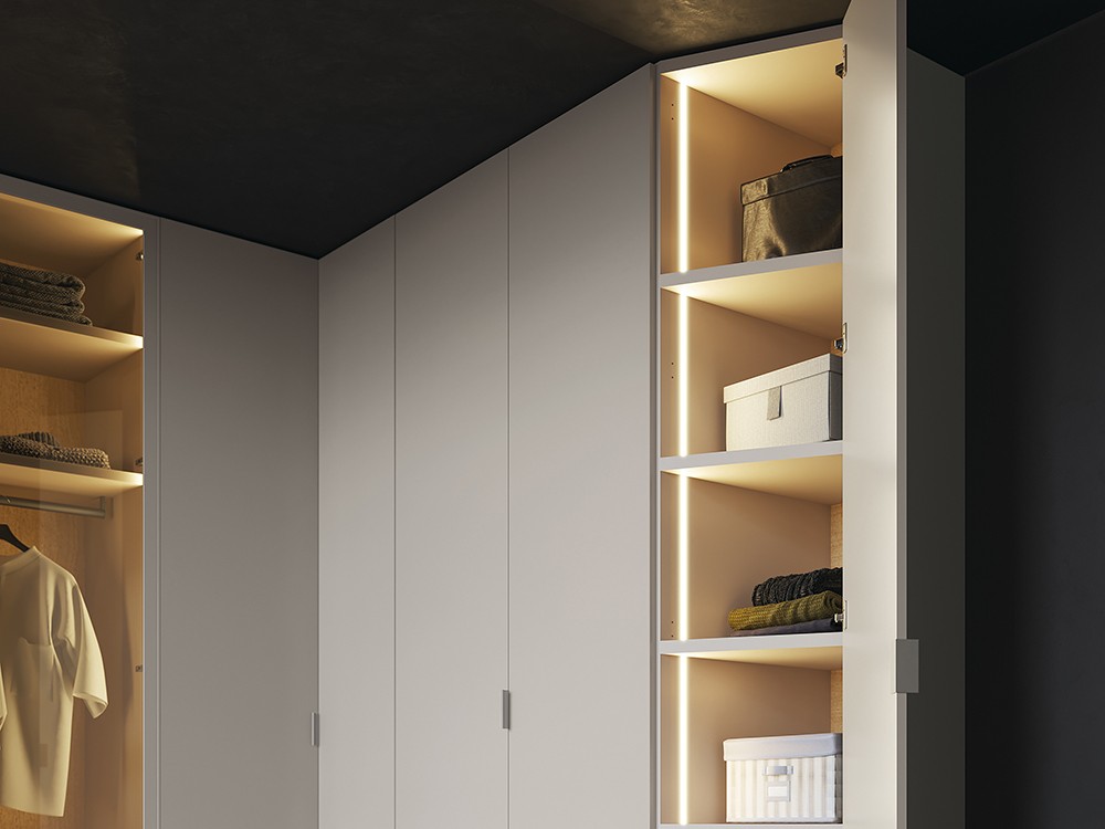 Con luz led en interiores, armario rincón Nuda vitrina y Zero de la colección Misura de García Sabaté