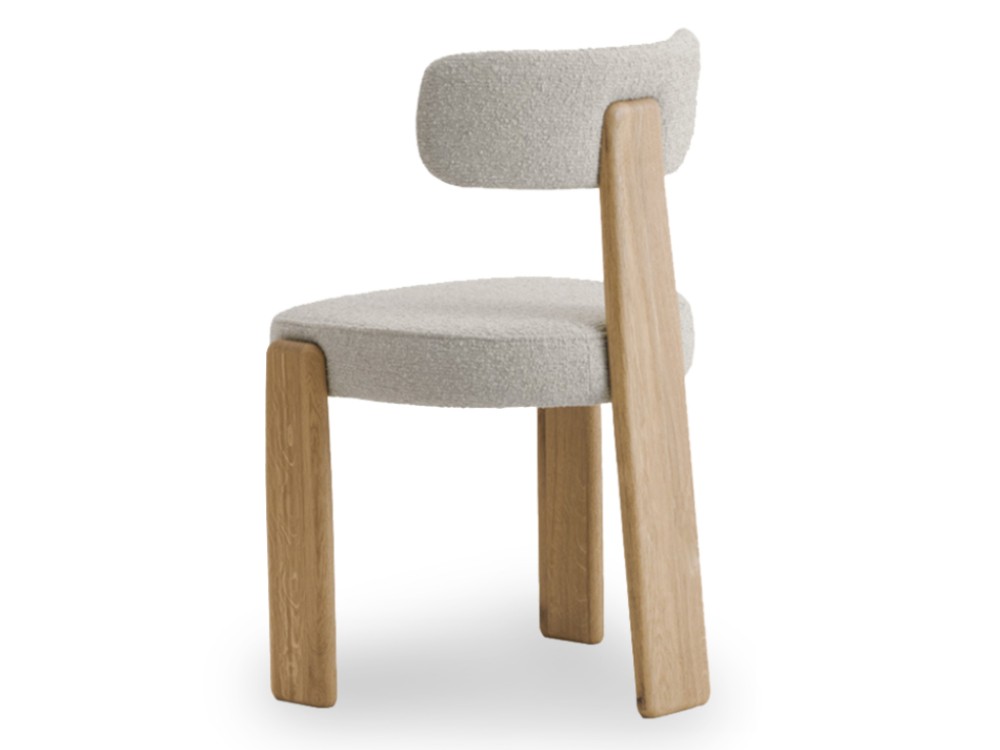 De líneas envolventes y confortables la silla para comedor Lea tapizada de Unika