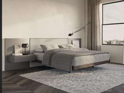 Dormitorio con cabecero corrido enmarcado tapizado con luz led Night Collection de Besform