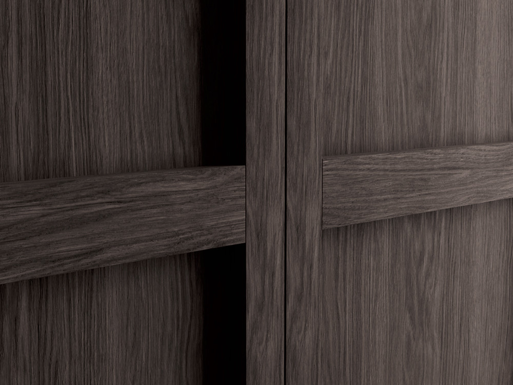 Detalle de las puertas Lar de chapa natural enmarcadas Besform Night Collection