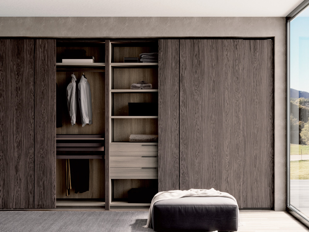 Armario de puertas correderas lisas en acabado chapa natural Besform Night collection