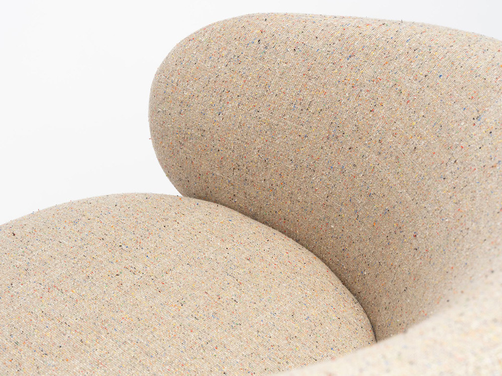 Detalle del tapizado de la butaca Ginger Ondarreta con patas de acero.