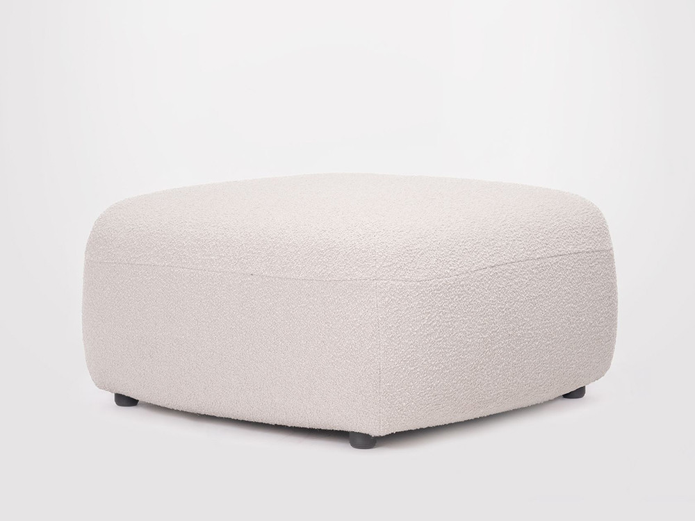 Mobiliario de salón Ondarreta: modelo puf Gumi con formas suaves y diseño personalizado.