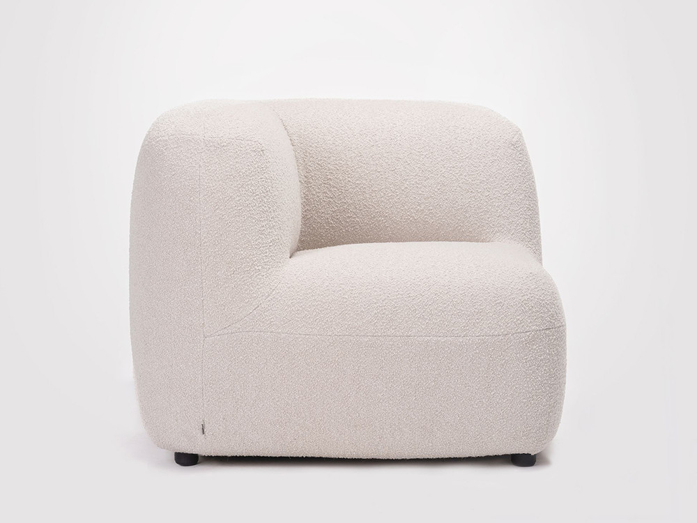 Detalle del módulo esquinero del sofá Gumi Ondarreta: confort y estética de líneas suaves