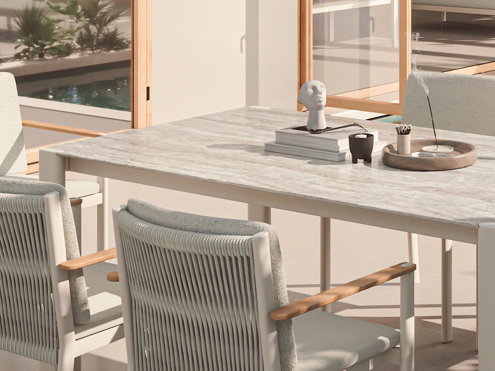 Mesa comedor exterior Patmos de Arkimueble: patas de aluminio y piedra sintetizada