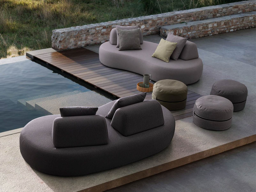 Sofá de terraza Cooper de Bizzotto: diseño de líneas orgánicas con respaldos movibles