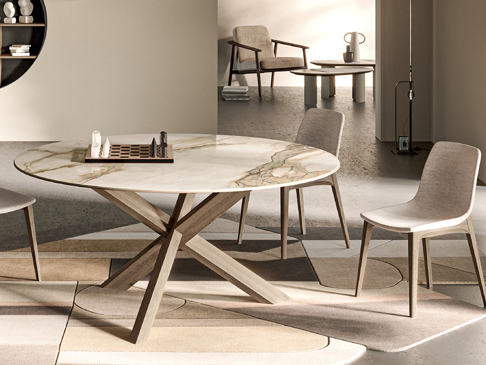 Mesa redonda de comedor Manhattan Ring Ceramics Cross de Devina Nais: sobre porcelánico y madera de tilo en Mobel 6000