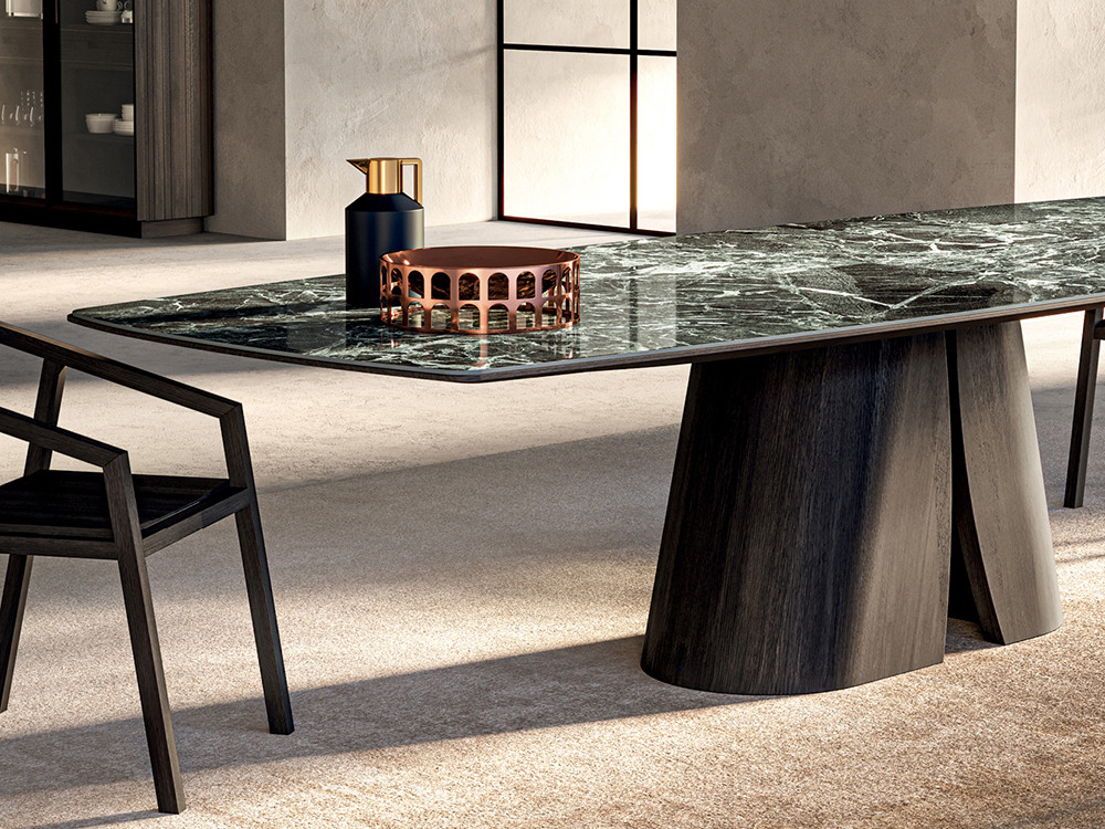 Comedores modernos Devina Nais: mesa Manhattan Barrel con base de hierro curvado y sobre de porcelánico en Mobel 6000