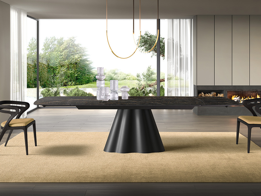 Mesa de comedor extensible Flam Keramik: sobre porcelánico y base escultórica de metal ondulado en Mobel 6000