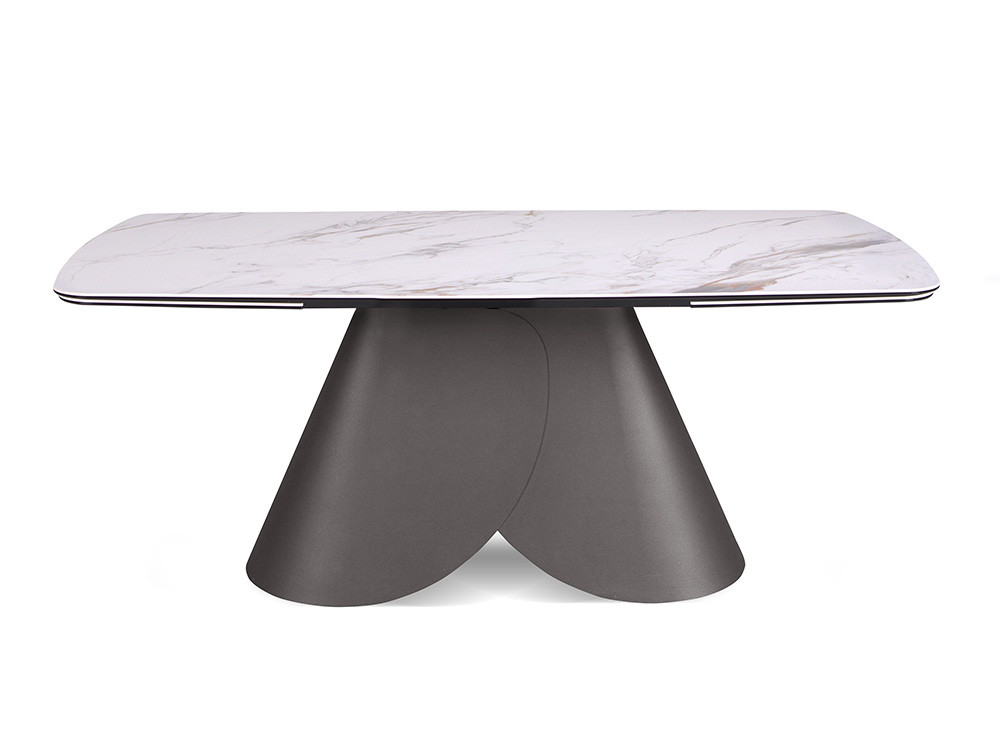 Comedores modernos con la mesa Lihue Barrel de Nacher: elegancia nacional con base escultórica de metal curvado en Mobel 6000