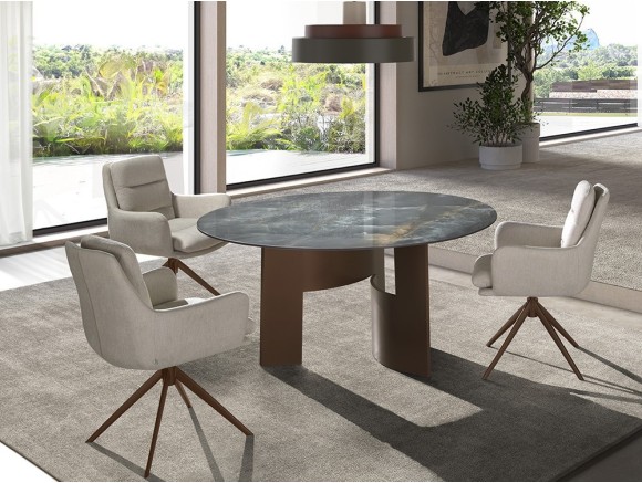 Mesa de comedor redonda Lambda A Keramic de Nacher: sobre porcelánico de 12mm y base escultórica de metal en Mobel 6000