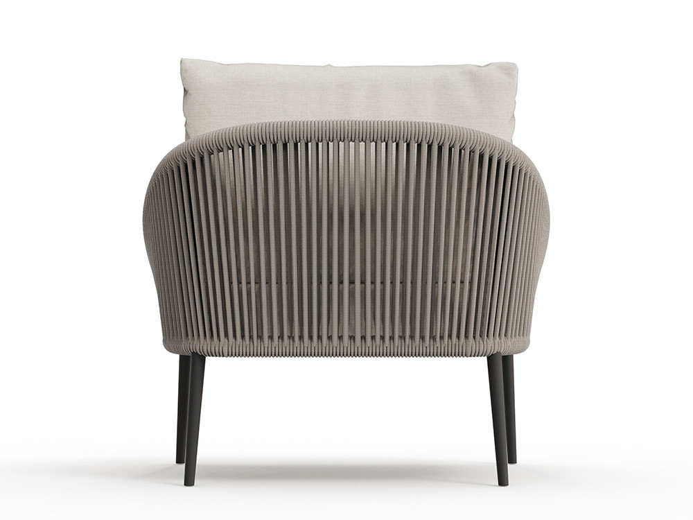 El sillón Rodona de Skyline ofrece confort con cuerda Beige y cojines desenfundables: diseño en Seismil Studio Madrid.