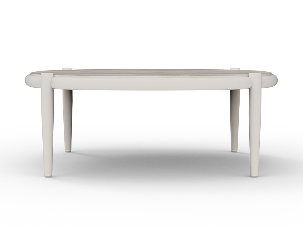 Descubra la mesa de centro Clover: porcelánico sobre aluminio blanco roto.