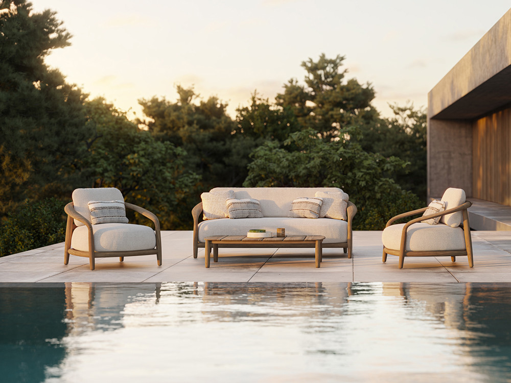 Los sillones de terraza Fusta de Vondom combinan madera de teca y tejidos suaves para que descanses con un estilo único.