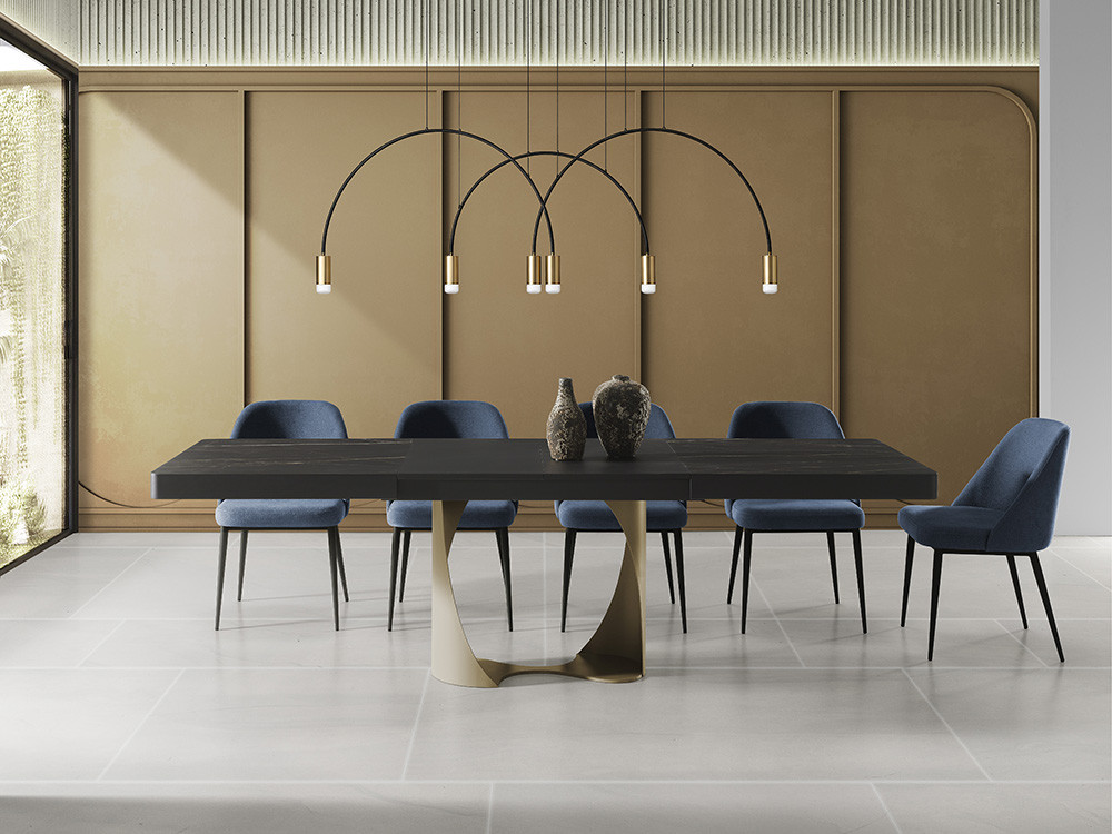 Visita Mobel 6000 en Madrid y elige la mesa comedor porcelánico Duna de Indesan. Acero texturizado con un acabado premium.