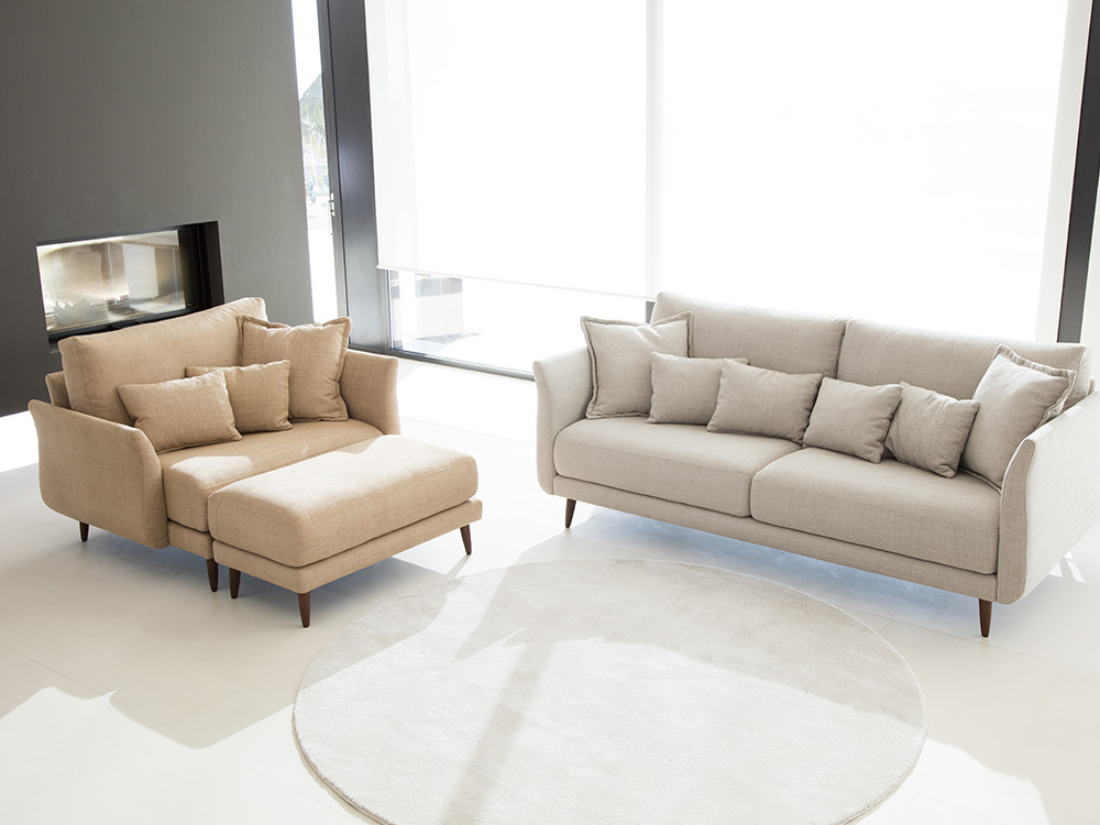Redefine tu descanso con la butaca moderna Helsinki de Fama. Personaliza el tejido con un acabado de gran estilo premium.