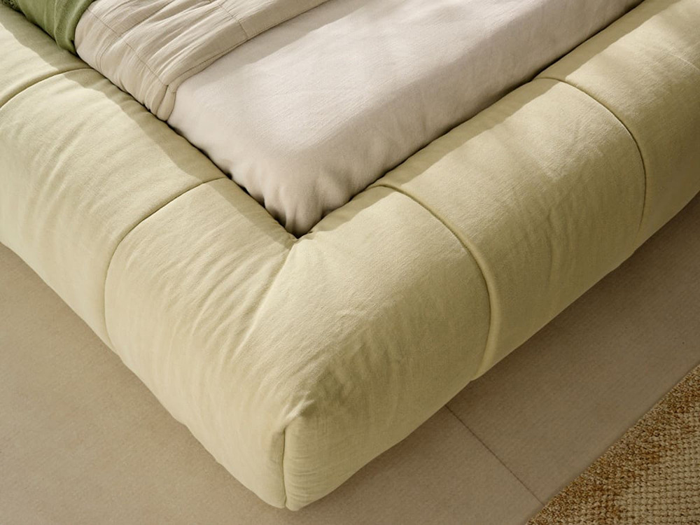 Disfruta de gran confort en tu dormitorio con la sutil cama tapizada Duna de Acana Piel, personalizable en tu tejido suave.