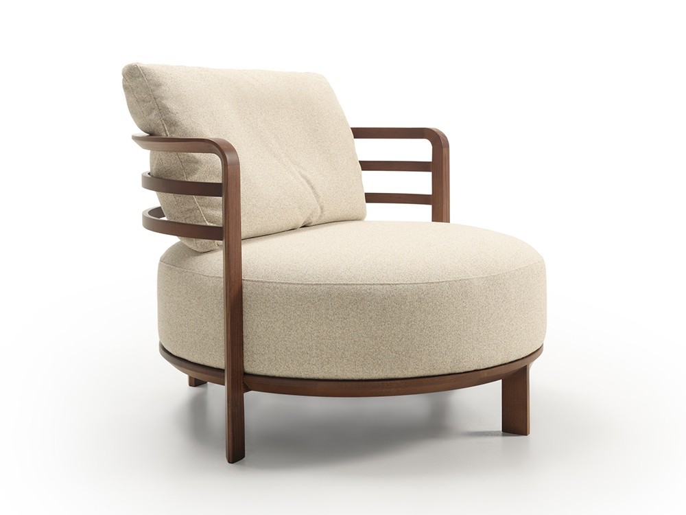 Diseña tu espacio de relax con la butaca Aro de Frajumar, tapizada en tejidos seleccionados y combinable con su puf Aro.