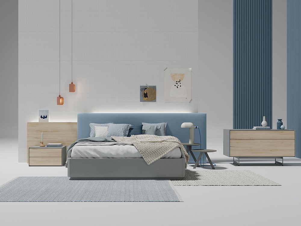 Dormitorio con cabecero modelo Plane tapizado en Fill pardo con lateral en moscato