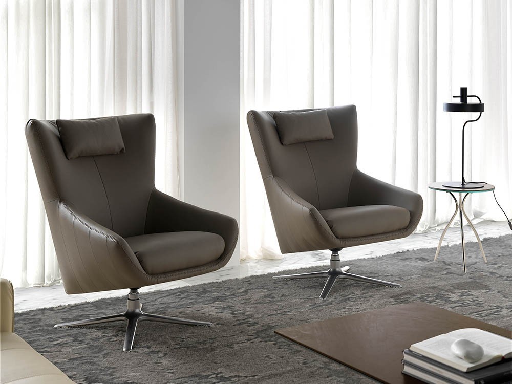 Sillón giratorio con pie de acero y asiento tapizado en piel sintética 5044 de Ángel Cerdá en Mobel 6000