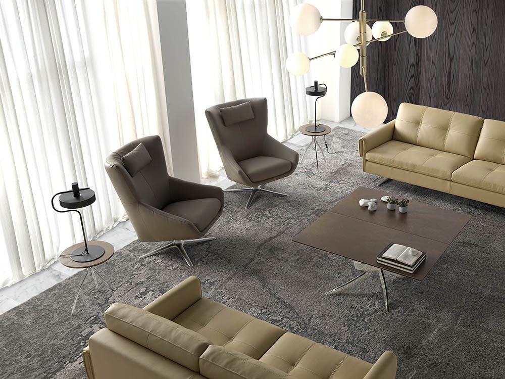 Sillón giratorio con pie de acero y asiento tapizado en piel sintética 5044 de Ángel Cerdá en Mobel 6000